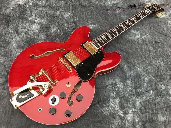china electric guitar oem shop electric guitar hollow jazz guitar big jazz vibrato system. transparent red, multi-position switch