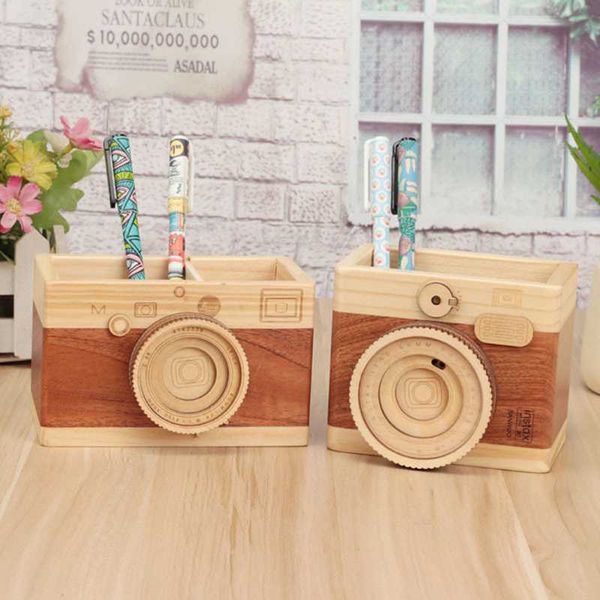 new creative retro wooden mini camera model pen holder storage ornaments deskcrafts home decoration stationery gifts
new creative retro wooden mini camera model pen holder storage ornaments deskcrafts home decoration stationery gifts