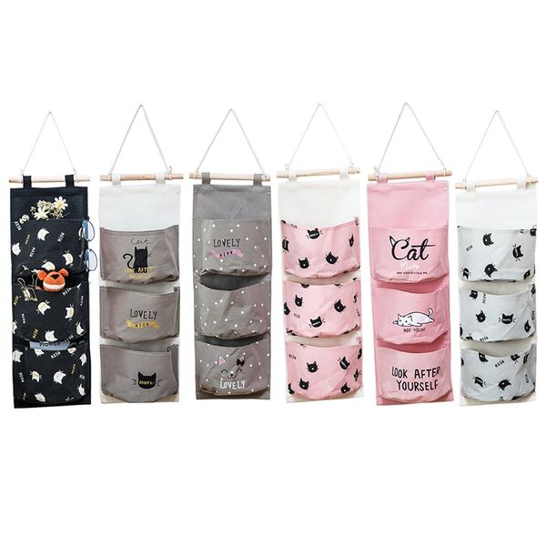 convenient and portable linen cotton fabric wall mounted three pockets storage bag
convenient and portable linen cotton fabric wall mounted three pockets storage bag