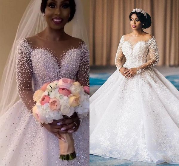 2020 plus size saudi arabic sparkly luxurious wedding dresses pearls crystals lace bridal gowns sheer neck wedding gown, White
2020 plus size saudi arabic sparkly luxurious wedding dresses pearls crystals lace bridal gowns sheer neck wedding gown, White