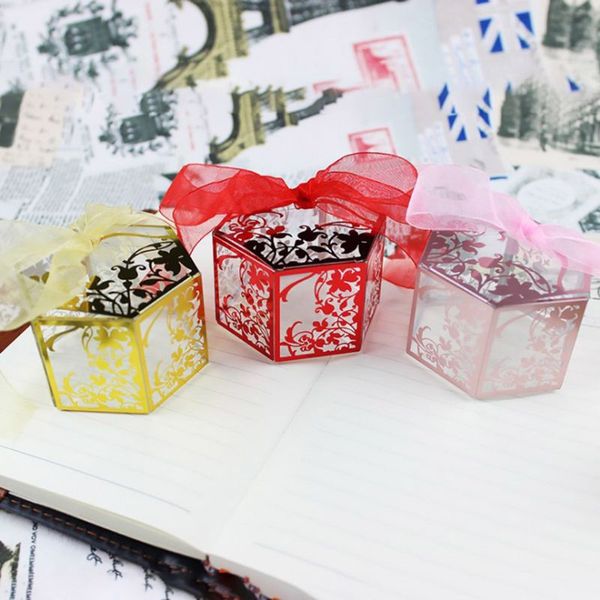 hexagon hollow floral print candy box holder gilding gift case for wedding party ribbon baby shower party supplies
hexagon hollow floral print candy box holder gilding gift case for wedding party ribbon baby shower party supplies
