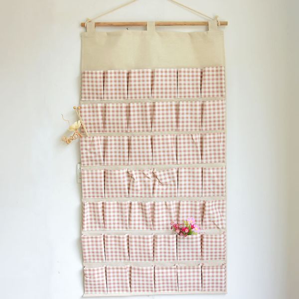 42cells wall storage bag, magazines, stationery, sanitary napkins, , postcards cosmetics, underwear, garment storage
42cells wall storage bag, magazines, stationery, sanitary napkins, , postcards cosmetics, underwear, garment storage