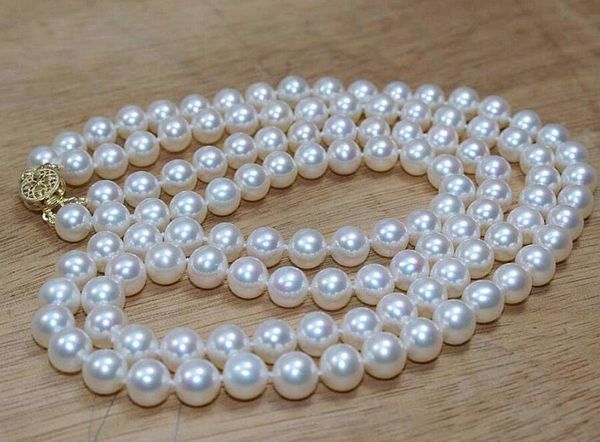 2 row 8-9mm white round freshwater genuine cultured pearl necklace 17"-18, Silver
2 row 8-9mm white round freshwater genuine cultured pearl necklace 17"-18, Silver