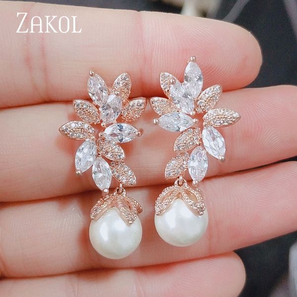 zakol fashion design elegant female jewelry white gold cz drop earings with imitation pearls for gift fsep568, Silver
zakol fashion design elegant female jewelry white gold cz drop earings with imitation pearls for gift fsep568, Silver
