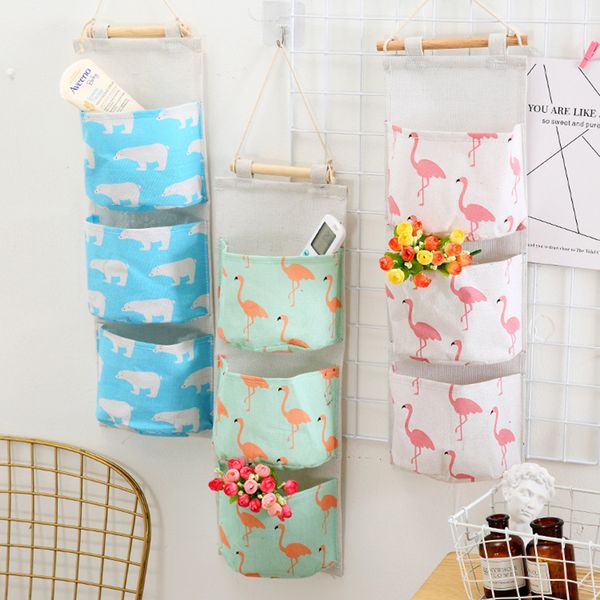 3 pockets wall mounted wardrobe hang bag flamingo pattern cotton linen hanging storage bag wall pouch cosmetic toys organizer
3 pockets wall mounted wardrobe hang bag flamingo pattern cotton linen hanging storage bag wall pouch cosmetic toys organizer