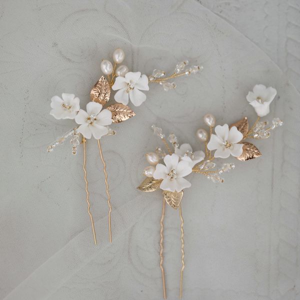 cimple white enamel flower bridal hairpins elegant women pearl hair clips jewelry gold colour leaf wedding hair accessories, Golden;silver
cimple white enamel flower bridal hairpins elegant women pearl hair clips jewelry gold colour leaf wedding hair accessories, Golden;silver