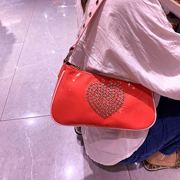 2020 summer new patent leather rhinestone girl love pu handbag patent leather baguette armpit fashion shoulder bag
2020 summer new patent leather rhinestone girl love pu handbag patent leather baguette armpit fashion shoulder bag