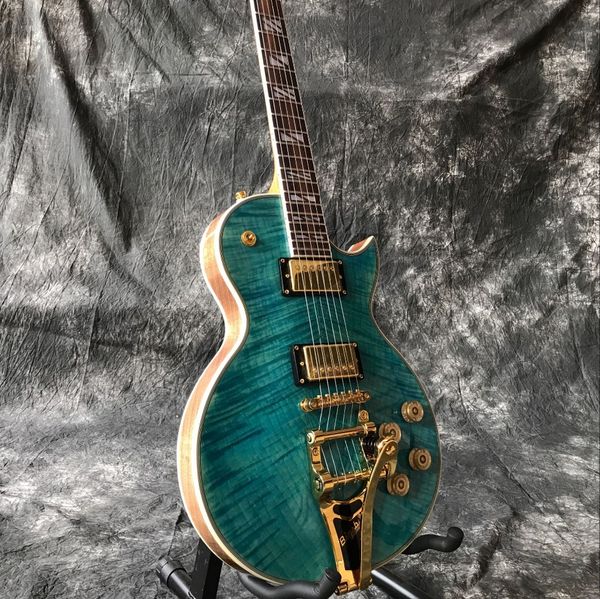 custom double tiger flame green color jazz electric guitar.golden hardware.standard custom guitarra.vibrato system
custom double tiger flame green color jazz electric guitar.golden hardware.standard custom guitarra.vibrato system
