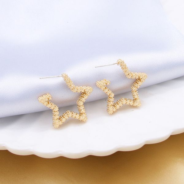 women wild metal pattern five-pointed star hoop earrings gold colors bump texture hollow earrings simple jewelry, Golden;silver
women wild metal pattern five-pointed star hoop earrings gold colors bump texture hollow earrings simple jewelry, Golden;silver