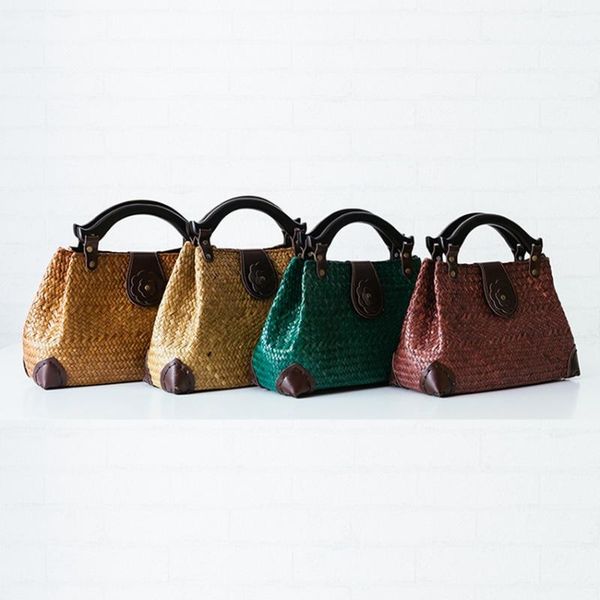 2020 new thai version of fashion seaweed woven bag wooden handle handbag travel package holiday beach bag
2020 new thai version of fashion seaweed woven bag wooden handle handbag travel package holiday beach bag