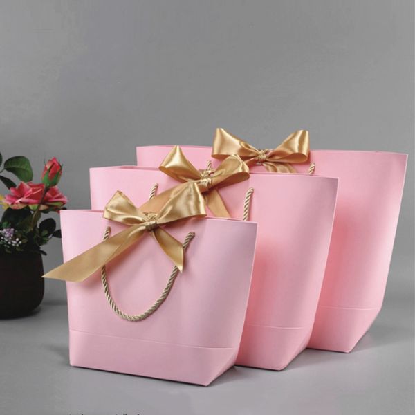 new pink gift bag with handle s gift box cake candy boxes kraft paper cardboard box packaging wedding birthday party favors
new pink gift bag with handle s gift box cake candy boxes kraft paper cardboard box packaging wedding birthday party favors