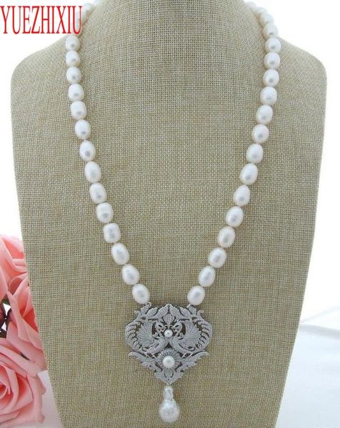 natural 9*11mm white rice freshwater pearl micro inlay zircon double phoenix accessories pendant sweater necklace long 50cm, Silver
natural 9*11mm white rice freshwater pearl micro inlay zircon double phoenix accessories pendant sweater necklace long 50cm, Silver