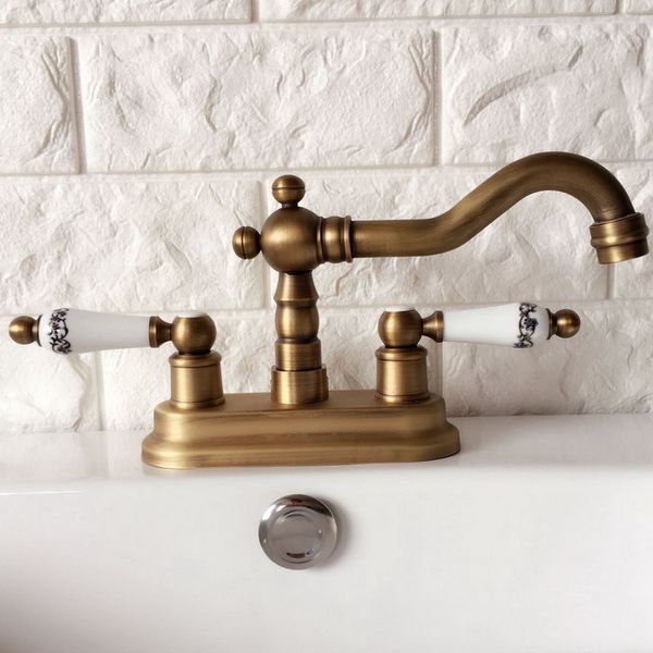 antique brass 4" centerset bathroom sink faucet swivel basin mixer tap dual ceramic handles levers man064
antique brass 4" centerset bathroom sink faucet swivel basin mixer tap dual ceramic handles levers man064