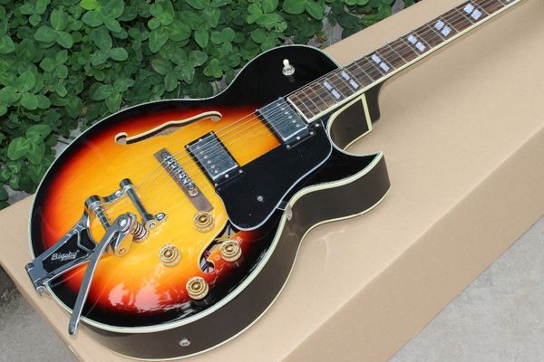 пользовательские двойной f полый корпус jazz электрогитара, sunburst color.rosewood fingerboard.chrome аппаратного gitaar, вибрато система
пользовательские двойной f полый корпус jazz электрогитара, sunburst color.rosewood fingerboard.chrome аппаратного gitaar, вибрато система