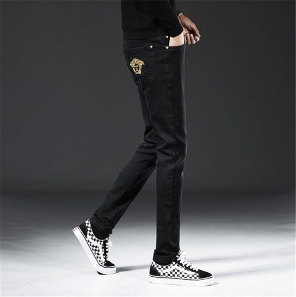 Pure black into men's jeans straight tube slim fitting cotton autumn winter high elastic jeans men's international brand
Pure black into men's jeans straight tube slim fitting cotton autumn winter high elastic jeans men's international brand