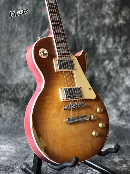 custom tiger flame sunburst standard custom electric guitar.relics by hands gitaar.cream pickguard guitar.one piece neck and body
custom tiger flame sunburst standard custom electric guitar.relics by hands gitaar.cream pickguard guitar.one piece neck and body