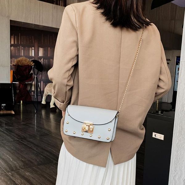 fashion women rivets bag solid color messenger bag shoulder hasp handbag luxury handbags women bags designer bolsa feminina
fashion women rivets bag solid color messenger bag shoulder hasp handbag luxury handbags women bags designer bolsa feminina