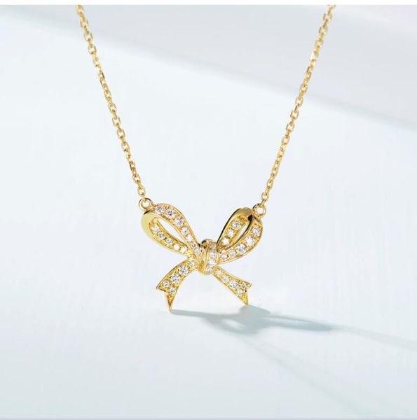2020 new arrival simple fashion jewelry 925 sterling silver&gold fill bow pendant sweet cute pave white sapphire women clavicle necklace
2020 new arrival simple fashion jewelry 925 sterling silver&gold fill bow pendant sweet cute pave white sapphire women clavicle necklace