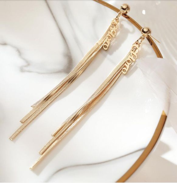 2020 new european and american style letter tassel simple long earrings 022, Golden;silver
2020 new european and american style letter tassel simple long earrings 022, Golden;silver