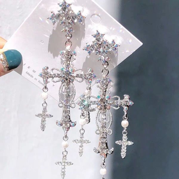 korean new trendy luxury style silver color crystal pearl cross dangle earrings for women elegant party jewelry
korean new trendy luxury style silver color crystal pearl cross dangle earrings for women elegant party jewelry
