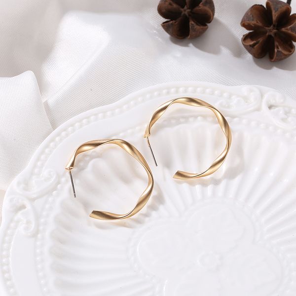 new creative simple geometric twist earrings for women antique matte circle earrings, Golden;silver
new creative simple geometric twist earrings for women antique matte circle earrings, Golden;silver