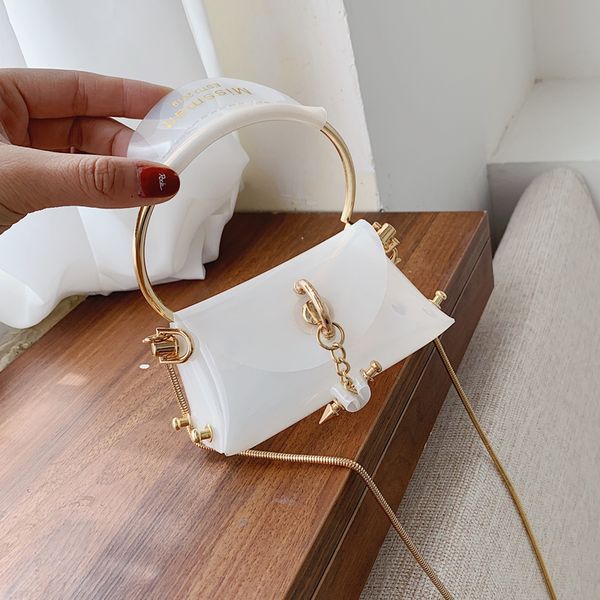 transparent mini tote jelly bag 2020 summer new pvc women's designer handbag lock chain shoulder messenger bag 
transparent mini tote jelly bag 2020 summer new pvc women's designer handbag lock chain shoulder messenger bag