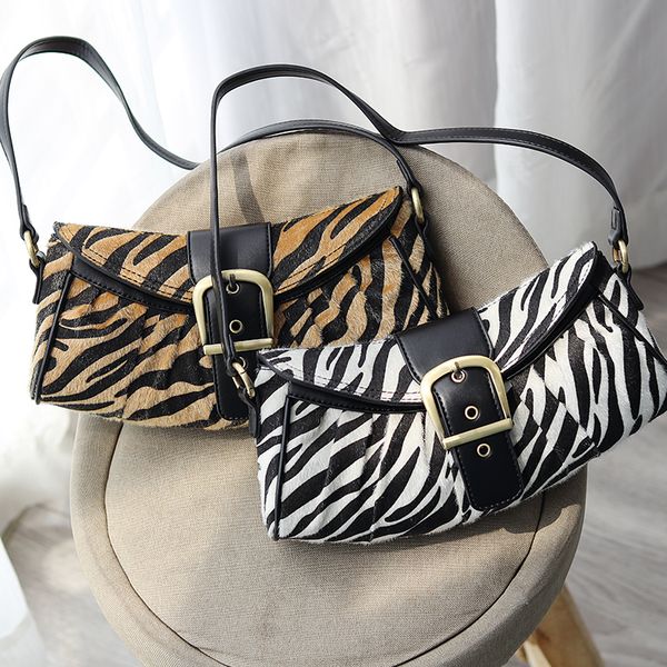 zebra pattern сумка багет 2020 новая мода личности saddle bag подмышек посланник trend женщины luxury
zebra pattern сумка багет 2020 новая мода личности saddle bag подмышек посланник trend женщины luxury