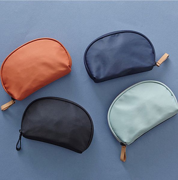 new fashion travel semicircle cosmetic bag travel wash, hand hold shell digital portable storage bag
new fashion travel semicircle cosmetic bag travel wash, hand hold shell digital portable storage bag