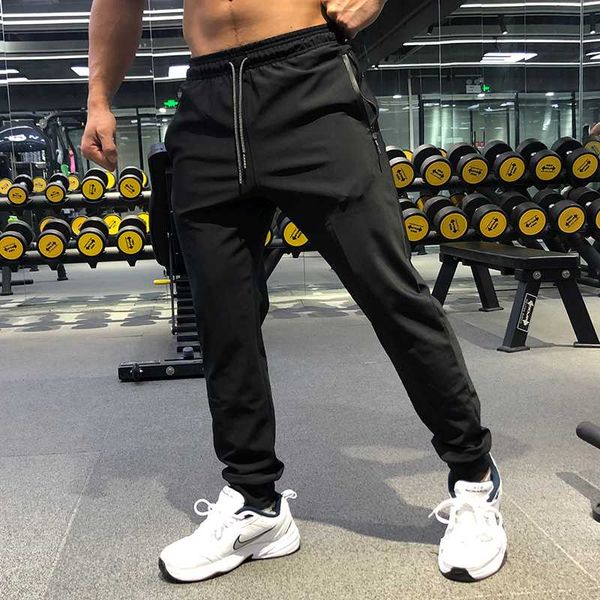 breathable waterproof elastic pants men fitness joggers gym running pants with zip pocket outdoor training sport spandex, Black;blue
breathable waterproof elastic pants men fitness joggers gym running pants with zip pocket outdoor training sport spandex, Black;blue