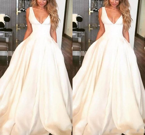 simple a line plus size wedding dresses deep v-neck sweep train pleats wedding dress bridal gowns with pockets vestidoe de noiva, White
simple a line plus size wedding dresses deep v-neck sweep train pleats wedding dress bridal gowns with pockets vestidoe de noiva, White