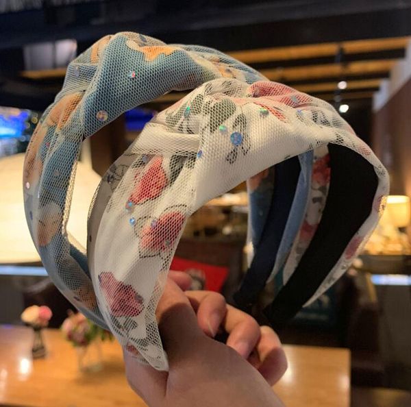 new sequined hairpin lace headdress korean version of the net red floral middle knotted twisted widebrimmed headband, Silver
new sequined hairpin lace headdress korean version of the net red floral middle knotted twisted widebrimmed headband, Silver