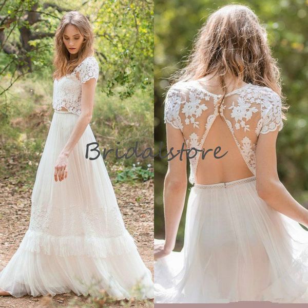 beach two piece country style lace wedding dresses 2021 backless short sleeve bohemian wedding dress a line tulle robes de mariée, White
beach two piece country style lace wedding dresses 2021 backless short sleeve bohemian wedding dress a line tulle robes de mariée, White