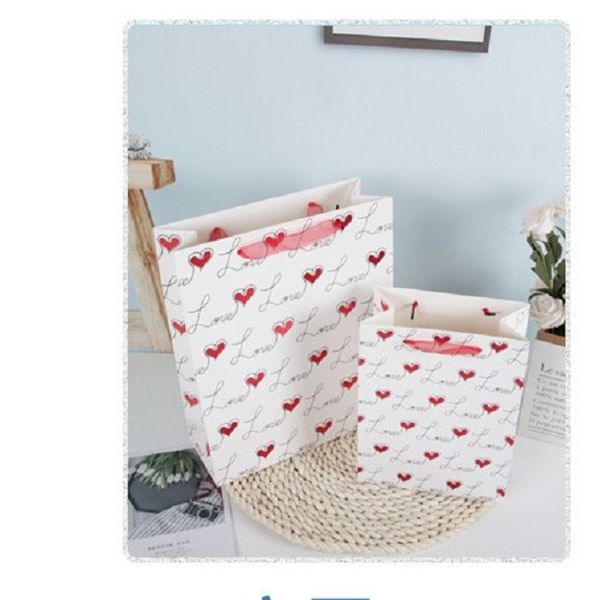2020 small fresh clothes shopping bag white cardboard portable paper bag general gift bag 30*41.5*12cm
2020 small fresh clothes shopping bag white cardboard portable paper bag general gift bag 30*41.5*12cm
