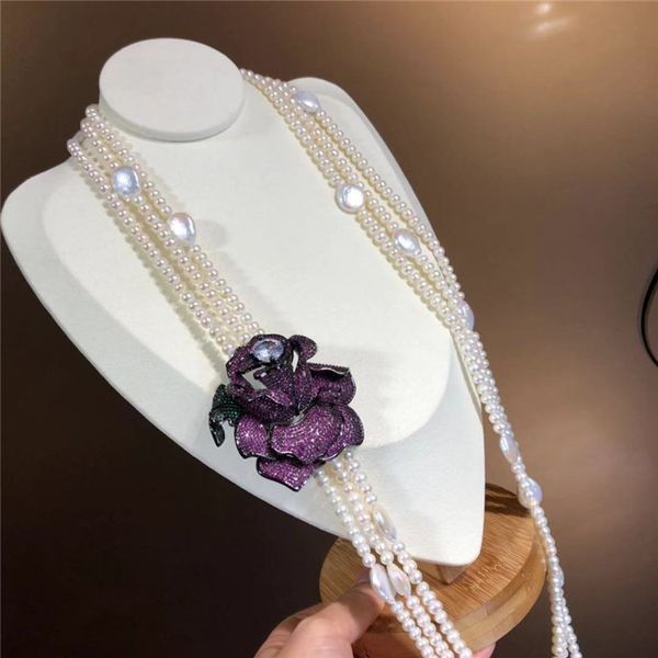 natural 3strand 5-6mm freshwater pearl 11-12mm coin pearl micro inlaid zircon flower buckle long style sweater necklace 30-33inc, Silver
natural 3strand 5-6mm freshwater pearl 11-12mm coin pearl micro inlaid zircon flower buckle long style sweater necklace 30-33inc, Silver