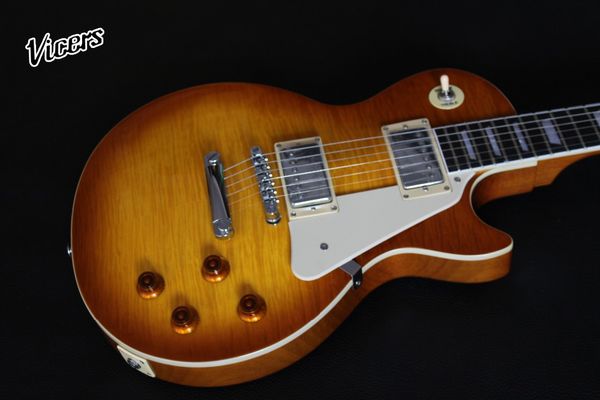 custom shop ,electric guitar, sunburst color tiger flame gitaar,white pickguard.one piece neck and body
custom shop ,electric guitar, sunburst color tiger flame gitaar,white pickguard.one piece neck and body
