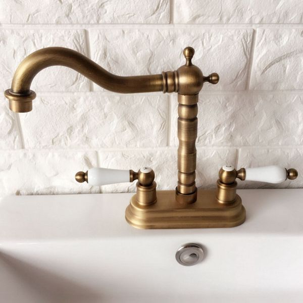 antique brass 4" centerset bathroom sink faucet swivel basin mixer tap dual ceramic handles levers man065
antique brass 4" centerset bathroom sink faucet swivel basin mixer tap dual ceramic handles levers man065