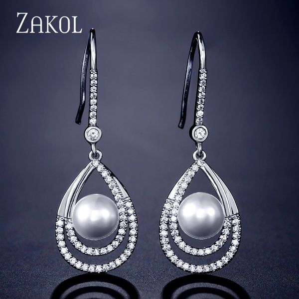 zakol drop-shaped hollow zircon crystal earrings for women wedding fashion imitation pearl jewelry accessories fsep2270, Silver
zakol drop-shaped hollow zircon crystal earrings for women wedding fashion imitation pearl jewelry accessories fsep2270, Silver
