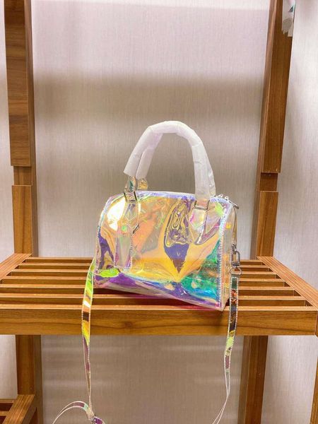 the designer designed the high-quality old flower laser magic color pillow bag, presenting different colors of handbags under different ligh
the designer designed the high-quality old flower laser magic color pillow bag, presenting different colors of handbags under different ligh
