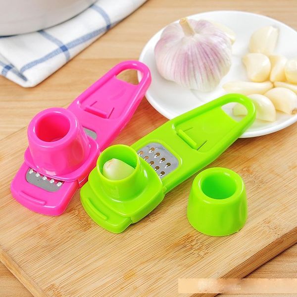 multifunction colorful garlic press plastic mini garlic grinder ginger grater cutter kitchen tool green and fushcia
multifunction colorful garlic press plastic mini garlic grinder ginger grater cutter kitchen tool green and fushcia