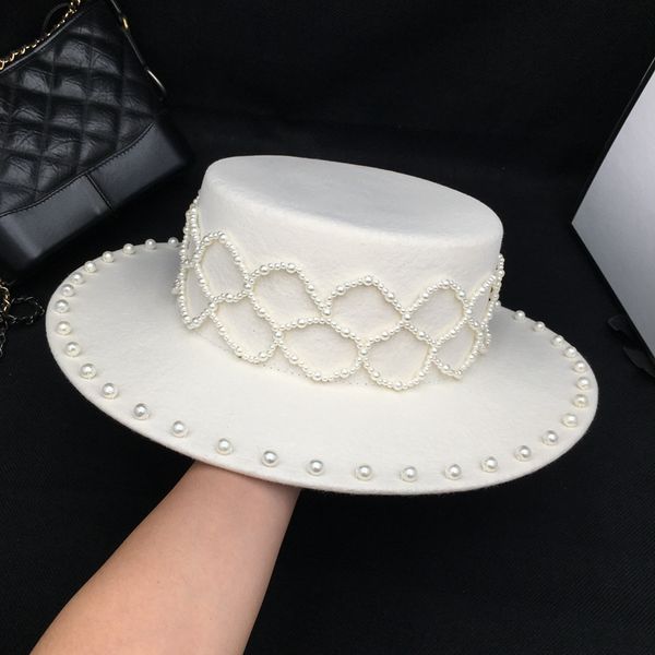 fedora new winter white wool women 's hat early handmade pearl gift women's cap socialite edition ins super fashion tide, Blue;gray
fedora new winter white wool women 's hat early handmade pearl gift women's cap socialite edition ins super fashion tide, Blue;gray