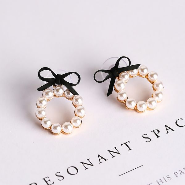 korean version of the summer cute color bow ladies earrings geometric round simulation pearl earrings boucle d'oreille brinco, Golden;silver 
korean version of the summer cute color bow ladies earrings geometric round simulation pearl earrings boucle d'oreille brinco, Golden;silver