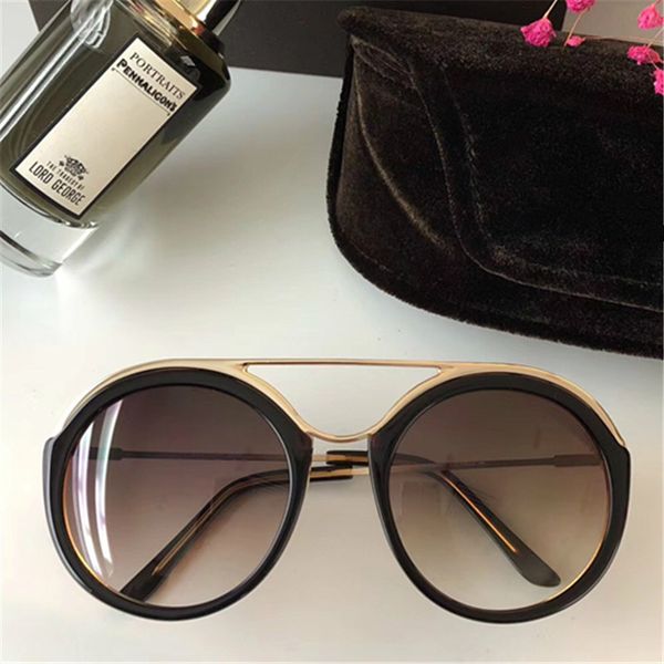 new 0605 sunglasses luxury fashion women brand designer popular retro style protection lens round frame come with package
new 0605 sunglasses luxury fashion women brand designer popular retro style protection lens round frame come with package