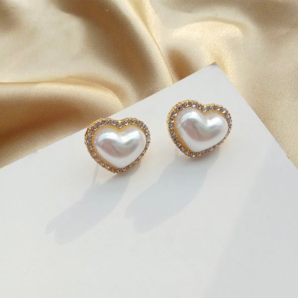 s1771 fashion jewelry cute heart earrings faux pearl heart stud earrings, Golden;silver
s1771 fashion jewelry cute heart earrings faux pearl heart stud earrings, Golden;silver