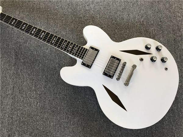 factory custom semi-hollow white electric guitar with fixed bridge,rosewood fretboard with white binding,can be customized
factory custom semi-hollow white electric guitar with fixed bridge,rosewood fretboard with white binding,can be customized