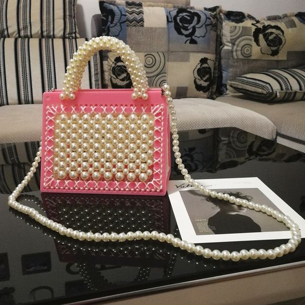 2020 luxury pearl chain shoulder messenger bags for women fashion beading decoration handbags sweet girl mini convenient wallet
2020 luxury pearl chain shoulder messenger bags for women fashion beading decoration handbags sweet girl mini convenient wallet