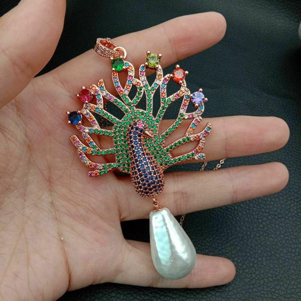 sea shell pearl cubic zirconia micro pave peacock pendant chain necklace, Silver
sea shell pearl cubic zirconia micro pave peacock pendant chain necklace, Silver