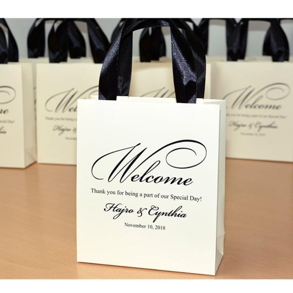 gift wrap personalized ivory wedding welcome bags with satin ribbon and your names elegant thank you for favor guests
gift wrap personalized ivory wedding welcome bags with satin ribbon and your names elegant thank you for favor guests