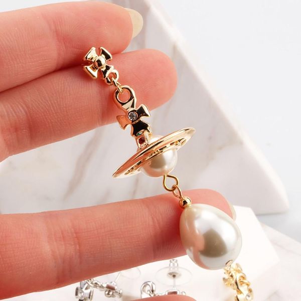 gold silver tassel dangle imitated pearl beads earrings cross saturn dangle earring women girl's planet ear11
gold silver tassel dangle imitated pearl beads earrings cross saturn dangle earring women girl's planet ear11
