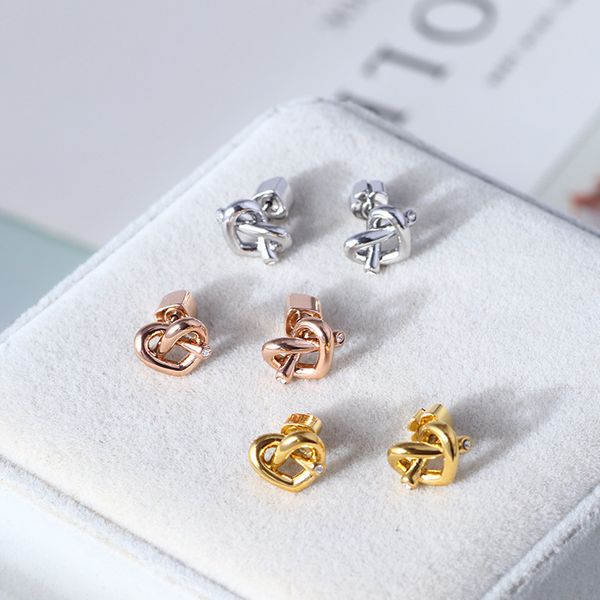 stud simple heart shape cubic zirconia earrings fashion rose gold color brand loves, Golden;silver
stud simple heart shape cubic zirconia earrings fashion rose gold color brand loves, Golden;silver