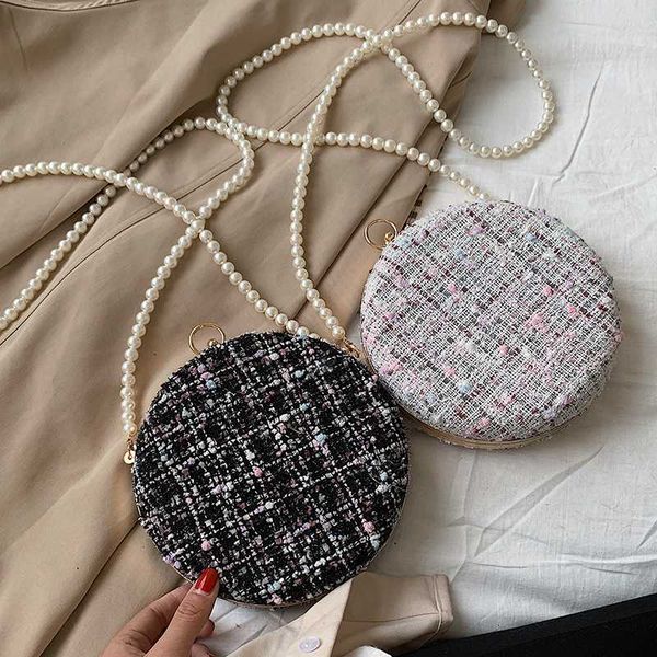 elegant female contrast color round bag 2020 fashion quality wool women's designer handbag pearl chain shoulder messenger bag
elegant female contrast color round bag 2020 fashion quality wool women's designer handbag pearl chain shoulder messenger bag